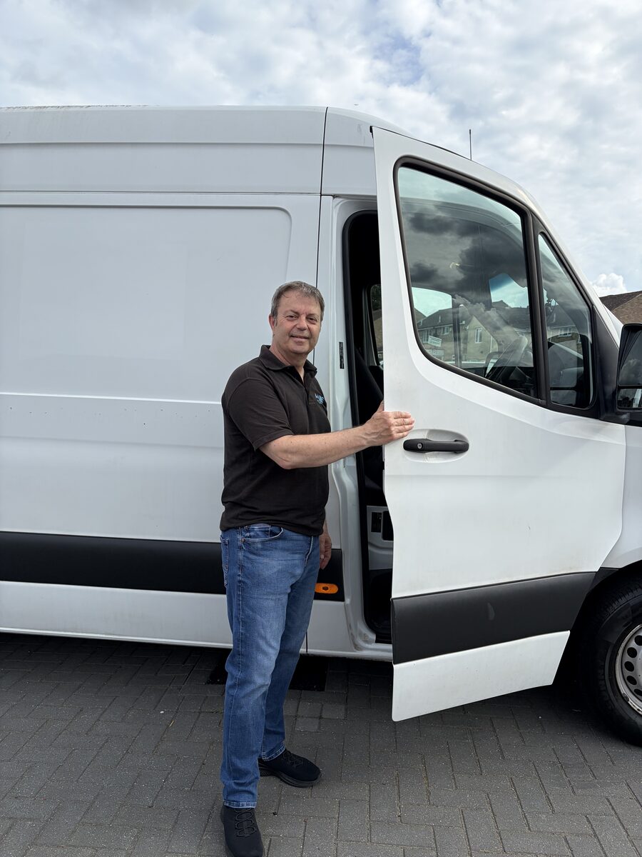 A-Line same-day courier driver with delivery van